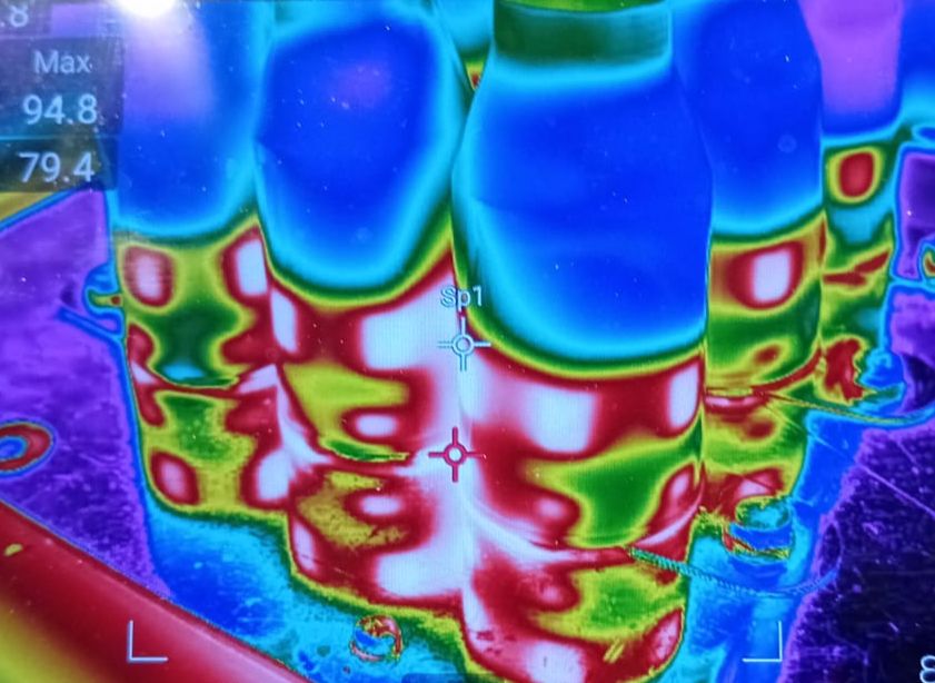 FLIR thermal image of busbar with SnapCor structured fault report showing location and equipment data